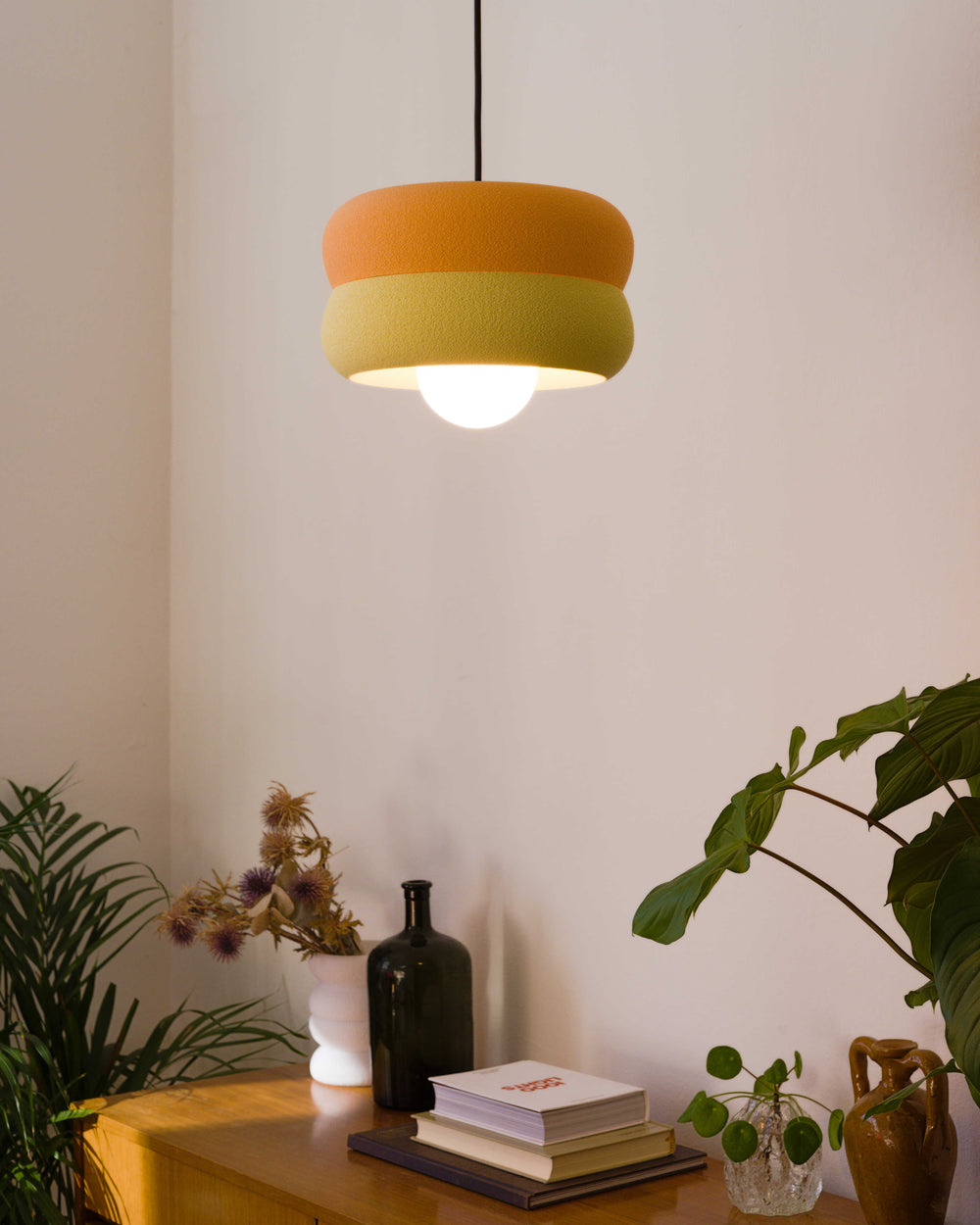 Peach Almond Ramon Ceiling Lamp illuminating room, soft warm light